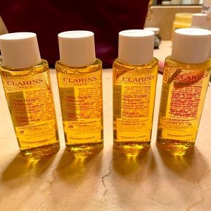 Clarins Hydrating Toning Lotion. Set of 4 1.6 oz each never opened, brand new.